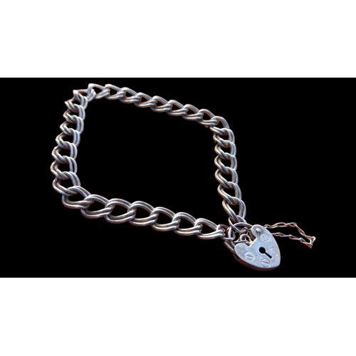 561 - A STERLING SILVER BRACELET WITH PADLOCK 12G