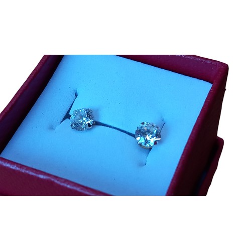 570 - PAIR OF 9ct SOLITAIRE EARRINGS