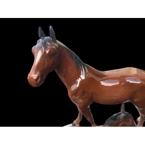 466 - A POTTERY GLAZED HORSE & FOAL MARKINGS TO BASE 7