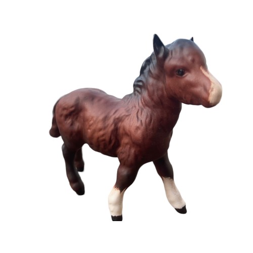 475 - A ROYAL DOULTON UNGLAZED PONY