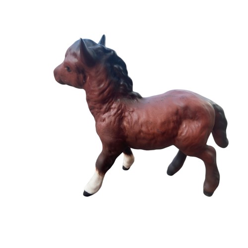 475 - A ROYAL DOULTON UNGLAZED PONY