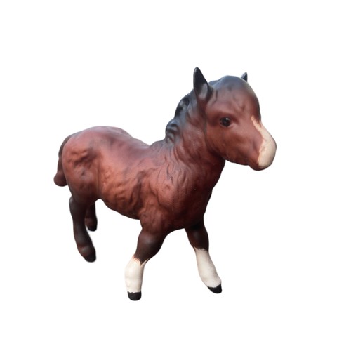 475 - A ROYAL DOULTON UNGLAZED PONY