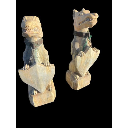 503 - A TALL PAIR OF VERY ORNATE DOG STATUES 30.5