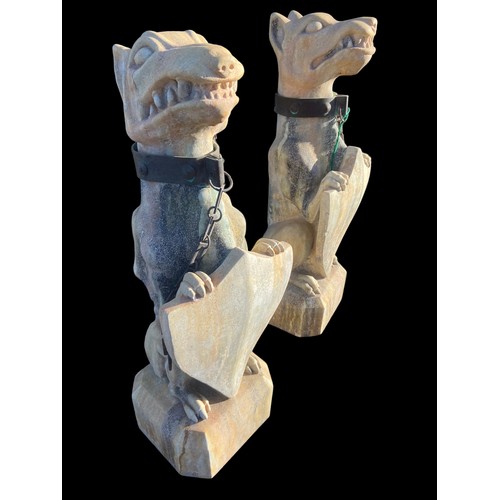 503 - A TALL PAIR OF VERY ORNATE DOG STATUES 30.5