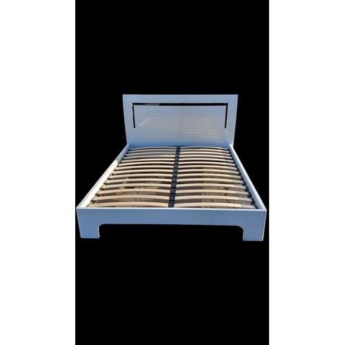 504 - A HIGH GLOSS WHITE 5FT BEDFRAME