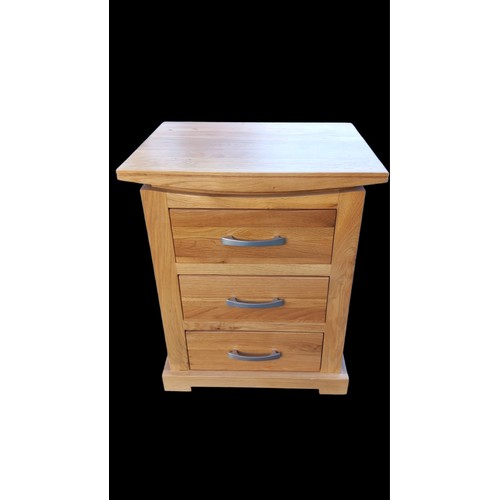 520 - AN OAK 3 DRAWER BEDSIDE 15 x 19 x 23.5