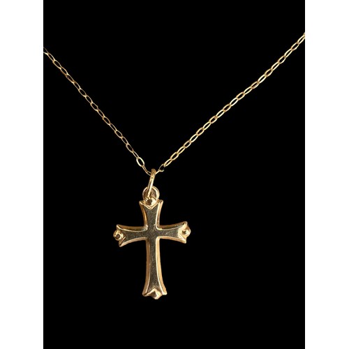 594 - A 9CT GOLD CROSS ON A 9CT GOLD CHAIN