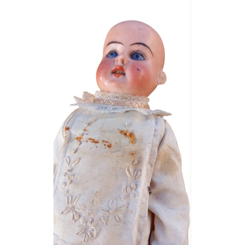 539 - A PORCELAIN FACED DOLL WITH AM-20 IMPRESSED ON BACK 11