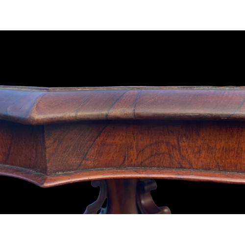 545 - A STUNNING  VICTORIAN ROSEWOOD DINING TABLE WITH A SHAPED EDGE ON A VERY ORNATE TRIPOD BASE 53