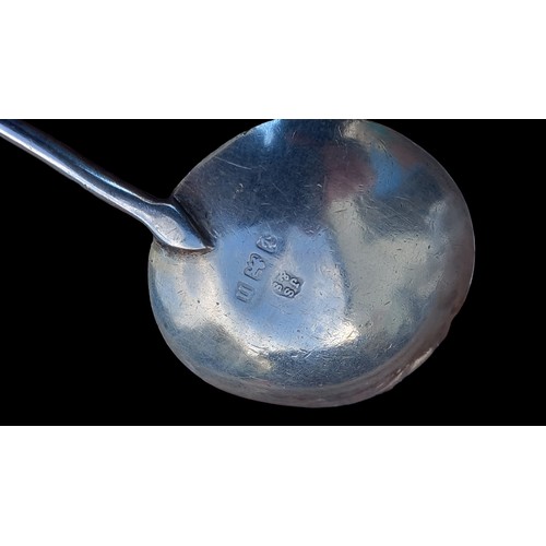 633 - AN USUAL BIRMINGHAM SILVER SPOON DATED 1912 BY J SHERWOOD & SONS