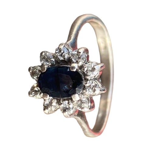 634 - A SILVER AND SAPPHIRE GEMSET RING