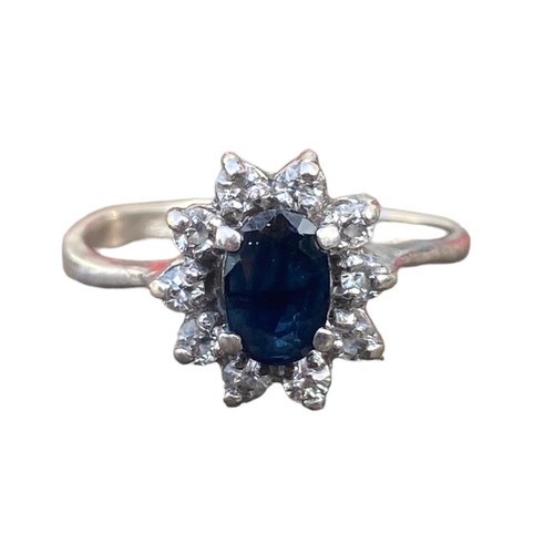 634 - A SILVER AND SAPPHIRE GEMSET RING