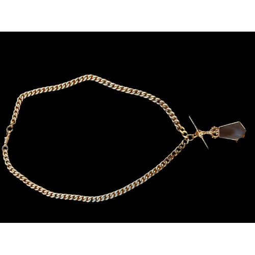 648 - A HEAVY 9CT GOLD CURB LINK CHAIN WITH A T.BAR WITH A DOUBLE SIDED PENDANT SET WITH MOTHER OF PEARL &... 