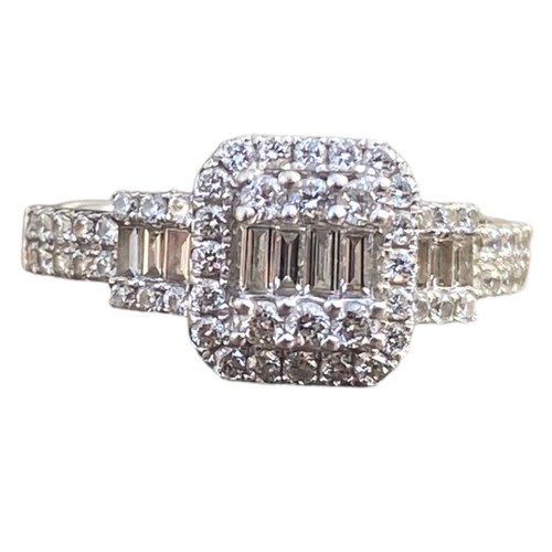 659 - AN 18ct GOLD AND MULTI DIAMOND RING