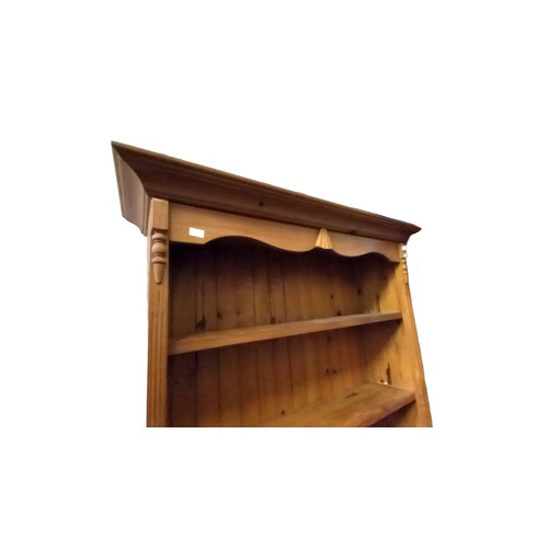 96 - AN OPEN BOOKCASE 82 x 52 AT CORNICE