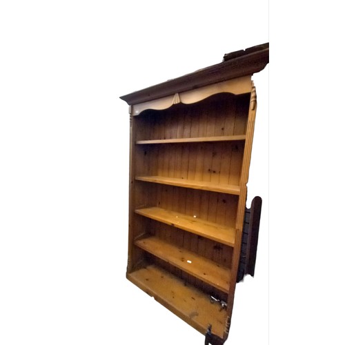 96 - AN OPEN BOOKCASE 82 x 52 AT CORNICE