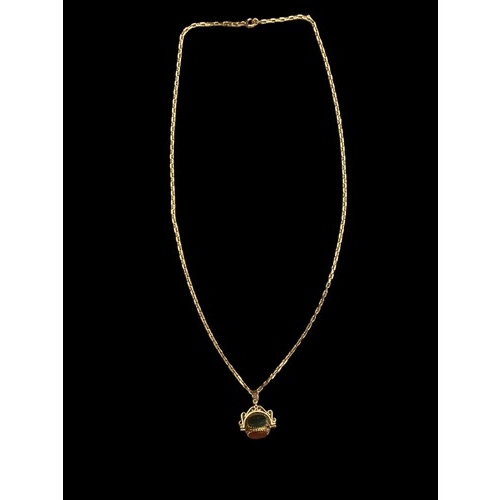 612 - A 9CT GOLD FANCY LINK CHAIN WITH AN ORNATE SWIVEL FOB SET WITH CORNELIAN, JET & GOLDSTONE