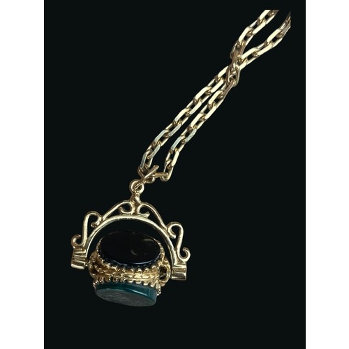 612 - A 9CT GOLD FANCY LINK CHAIN WITH AN ORNATE SWIVEL FOB SET WITH CORNELIAN, JET & GOLDSTONE