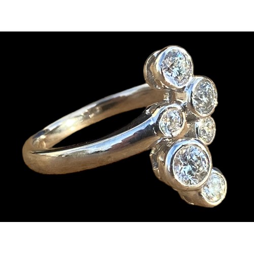 703 - A STUNNING BOODLES STYLE 18CT WHITE GOLD RING SET WITH LARGE BRIGHT CUT DIAMONDS