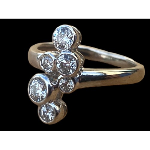 703 - A STUNNING BOODLES STYLE 18CT WHITE GOLD RING SET WITH LARGE BRIGHT CUT DIAMONDS