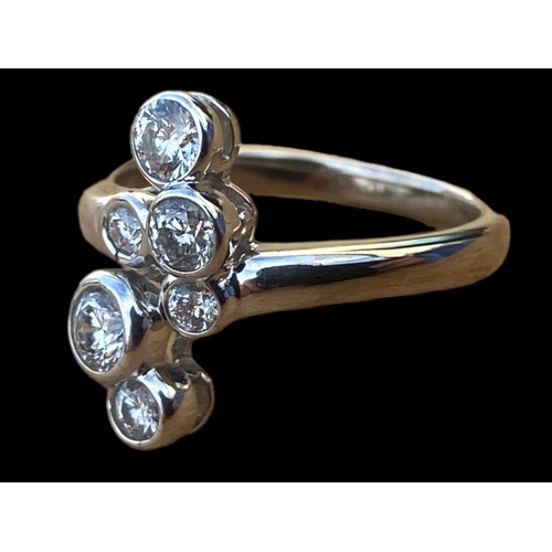 703 - A STUNNING BOODLES STYLE 18CT WHITE GOLD RING SET WITH LARGE BRIGHT CUT DIAMONDS