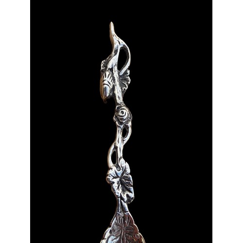 739 - AN ANTIQUE SILVER PICKLE FORK & EXTREMLY ORNATE SPOON