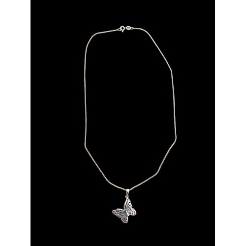 747 - A SILVER BUTTERFLY PENDANT ON A SILVER CHAIN