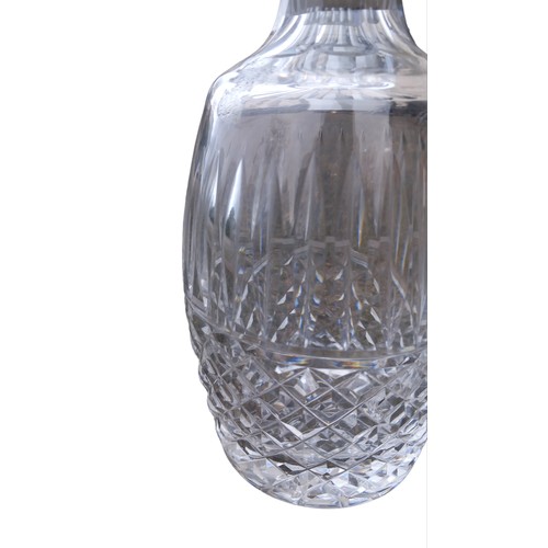 831 - A LOVELY SHAPED WATERFORD DECANTER WITH STOPPER