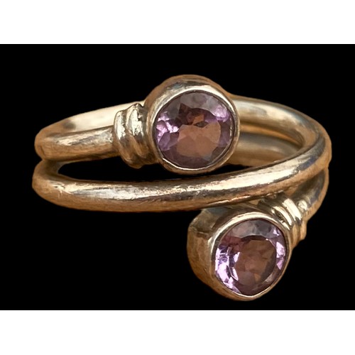 762 - A STUNNING MUTLI BAND SILVER RING SET WITH 2 AMETHYST STONES