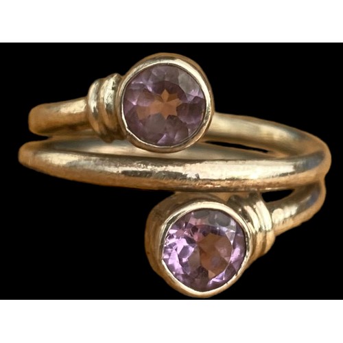 762 - A STUNNING MUTLI BAND SILVER RING SET WITH 2 AMETHYST STONES