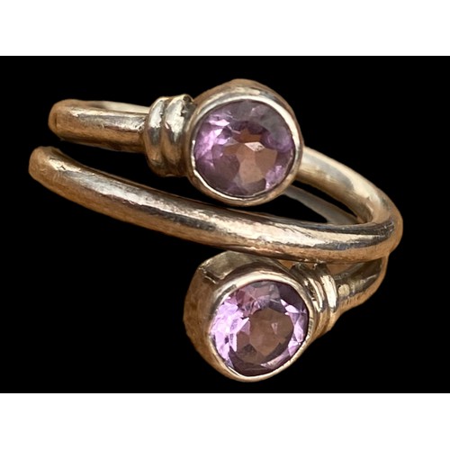 762 - A STUNNING MUTLI BAND SILVER RING SET WITH 2 AMETHYST STONES