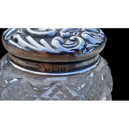 768 - A BIRMINGHAM SILVER TOPPED CUT GLASS JAR