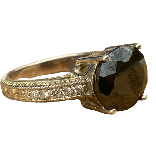 775 - A DESIGNER ORNATE BAND SILVER RING WITH DARK TOPAZ STONE WITH A GEM SET SHOULDER