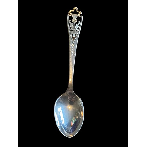 850 - A SCOTTISH SILVER SPOON SET WITH A THISTLE