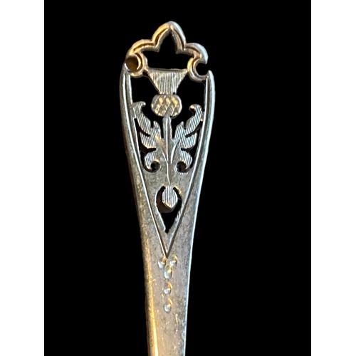 850 - A SCOTTISH SILVER SPOON SET WITH A THISTLE