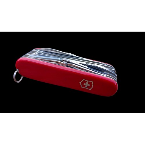 784 - VICTORINOX LEATHER CASED SWISS ARMY KNIFE