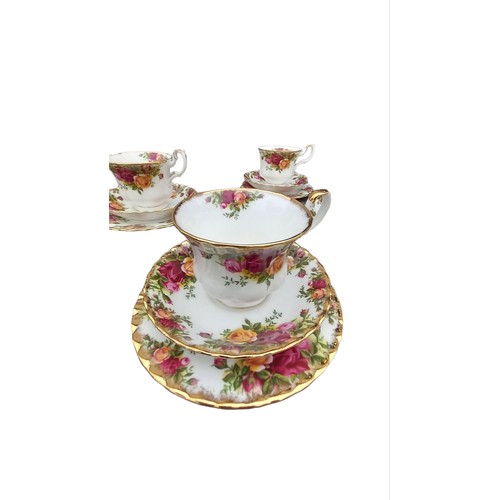 779A - A 25 PIECE OLD COUNTRY ROSE TEA SERVICE BY ROYAL ALBERT