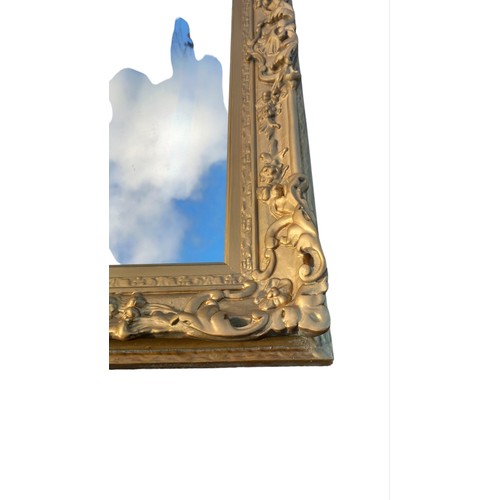 180A - AN ORNATE VICTORIAN WALL HANGING MIRROR