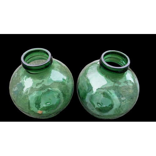 34 - A PAIR OF GREEN GLASS BELL JARS 14