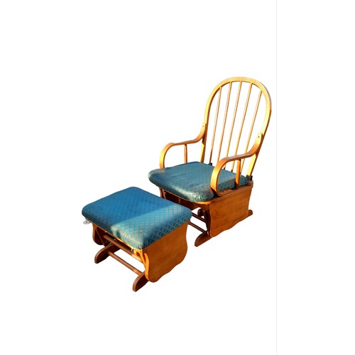 48 - A GLIDING ROCKING CHAIR AND MATCHING STOOL