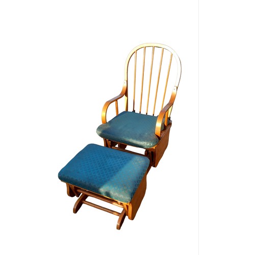 48 - A GLIDING ROCKING CHAIR AND MATCHING STOOL