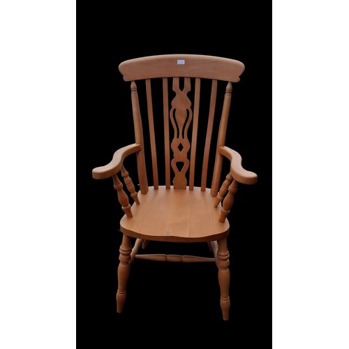 146 - A GOOD QUALITY PINE ARMCHAIR WITH SLAT BACK