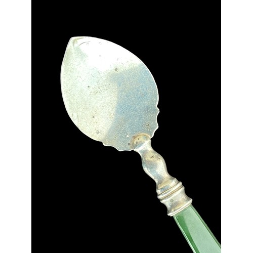 161 - AN UNUSUAL SILVER SPOON WITH A JADE STYLE HANDLE