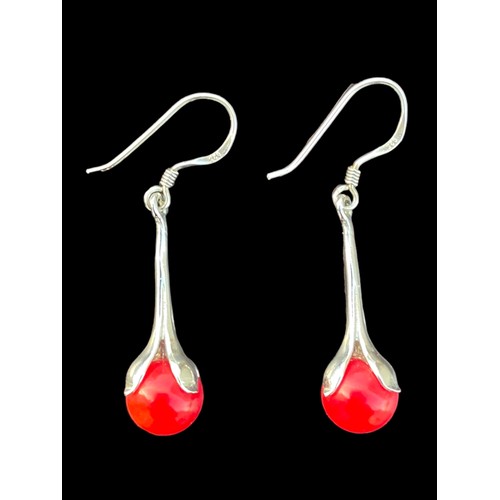 182 - A PAIR OF ORNATE DROP EARRINGS WITH RED STONES