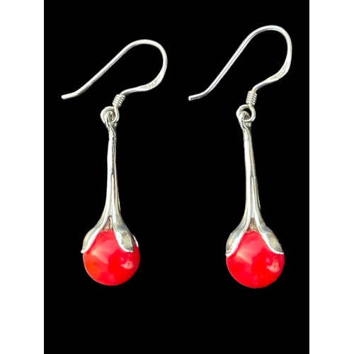 182 - A PAIR OF ORNATE DROP EARRINGS WITH RED STONES