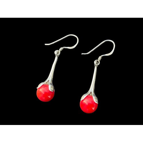 182 - A PAIR OF ORNATE DROP EARRINGS WITH RED STONES