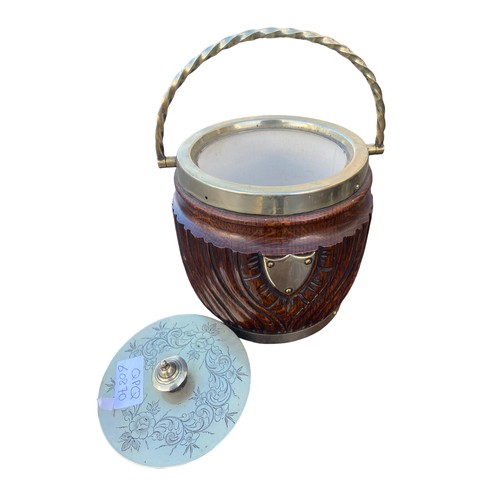 35 - HEAVY CARVED OAK BISCUIT BARREL WITH PLATED TOP AND LINER