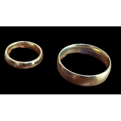 179 - A SILVER GOLD PLATED HIS & HERS RING SET