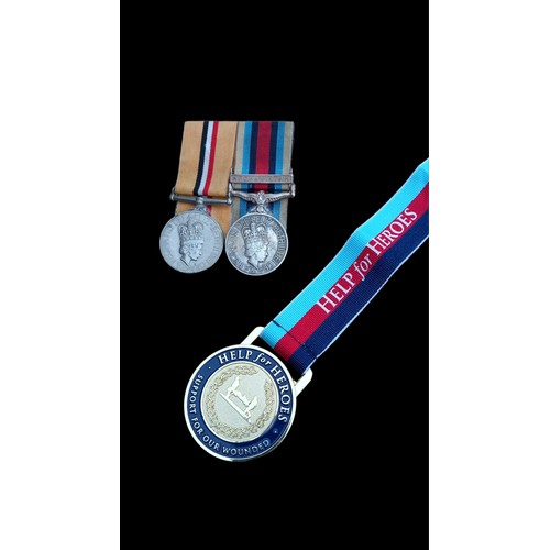 488 - 2 MEDALS 1 FOR IRAQ AND 1 FOR AFGANISTAN ALONG WITH A HELP FOR HEROs MEDALLION PTE N S KENNEDY RLC 2... 