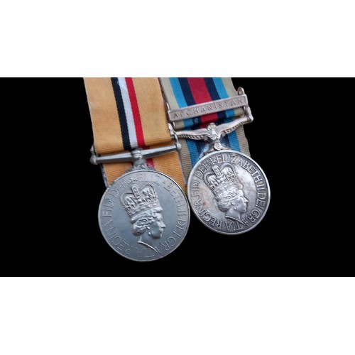 488 - 2 MEDALS 1 FOR IRAQ AND 1 FOR AFGANISTAN ALONG WITH A HELP FOR HEROs MEDALLION PTE N S KENNEDY RLC 2... 